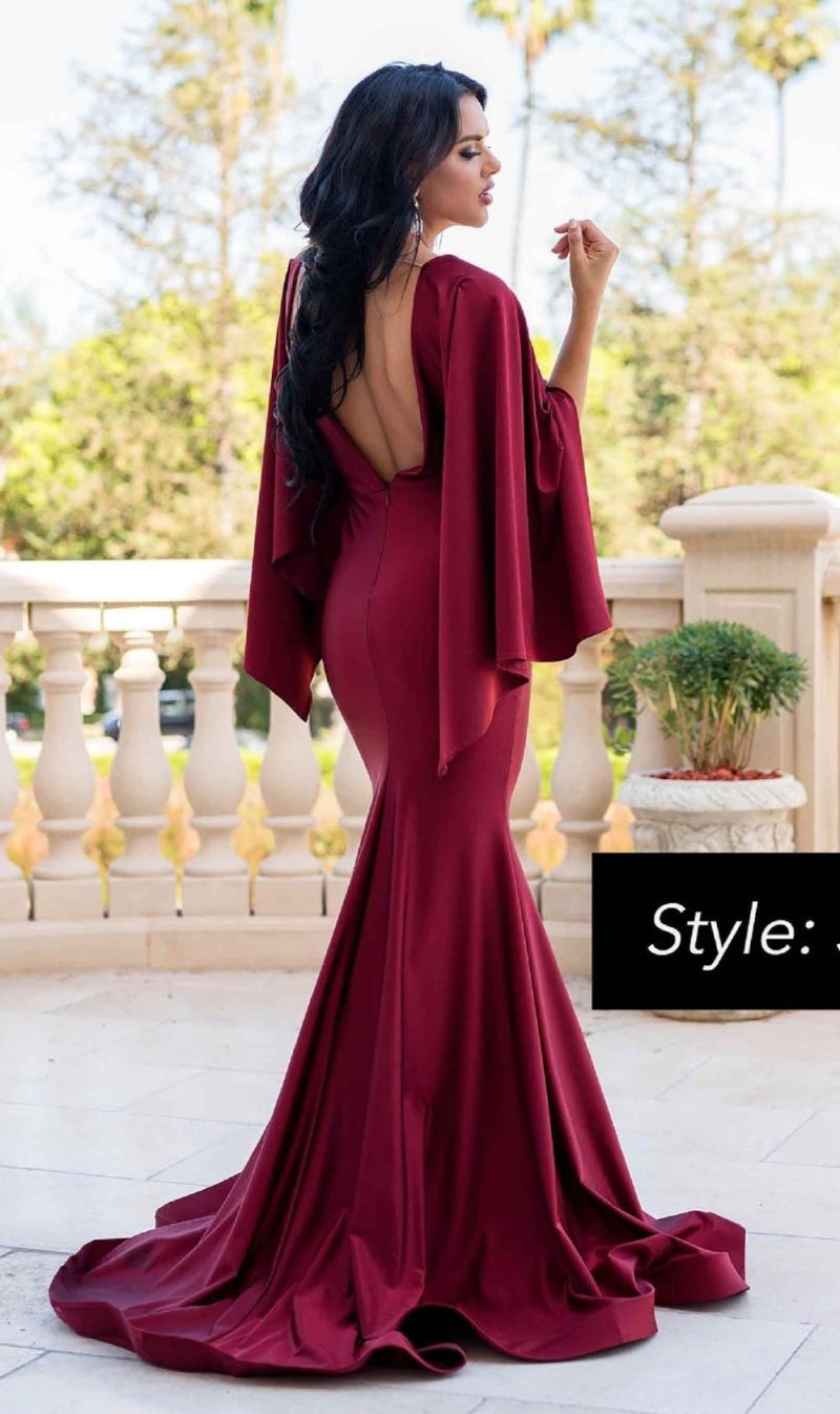 backless evening gown with cape