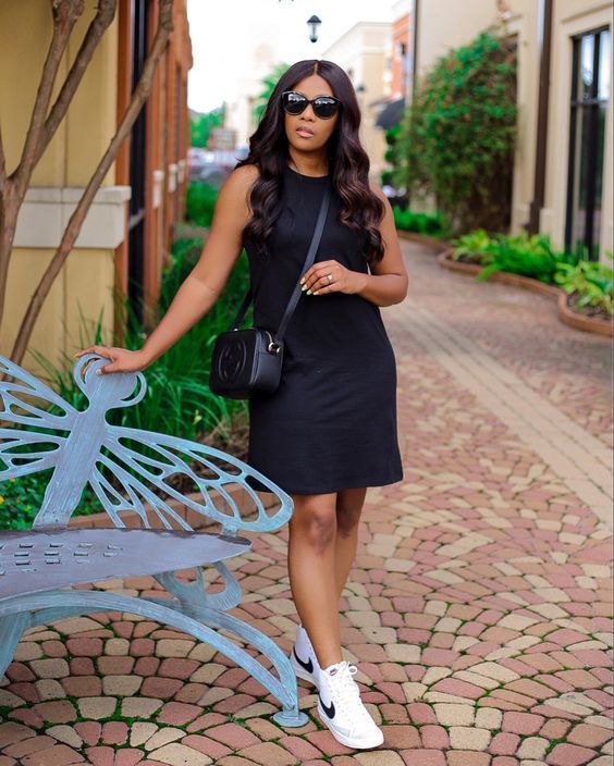 black shirt dress with sneakers